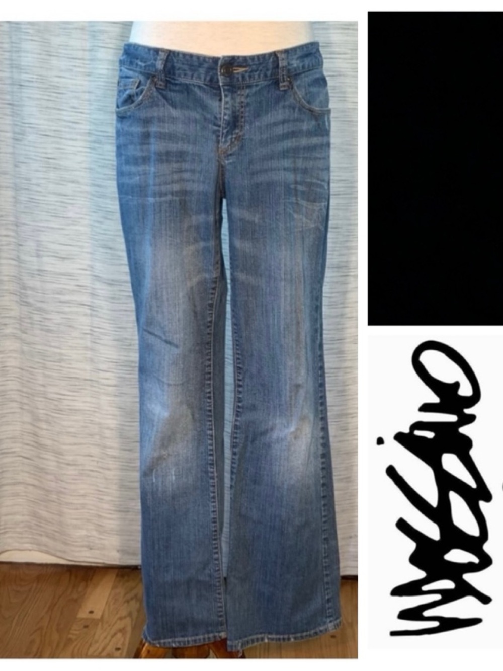 Mossimo Supply Co. bootcut denim blue jeans.